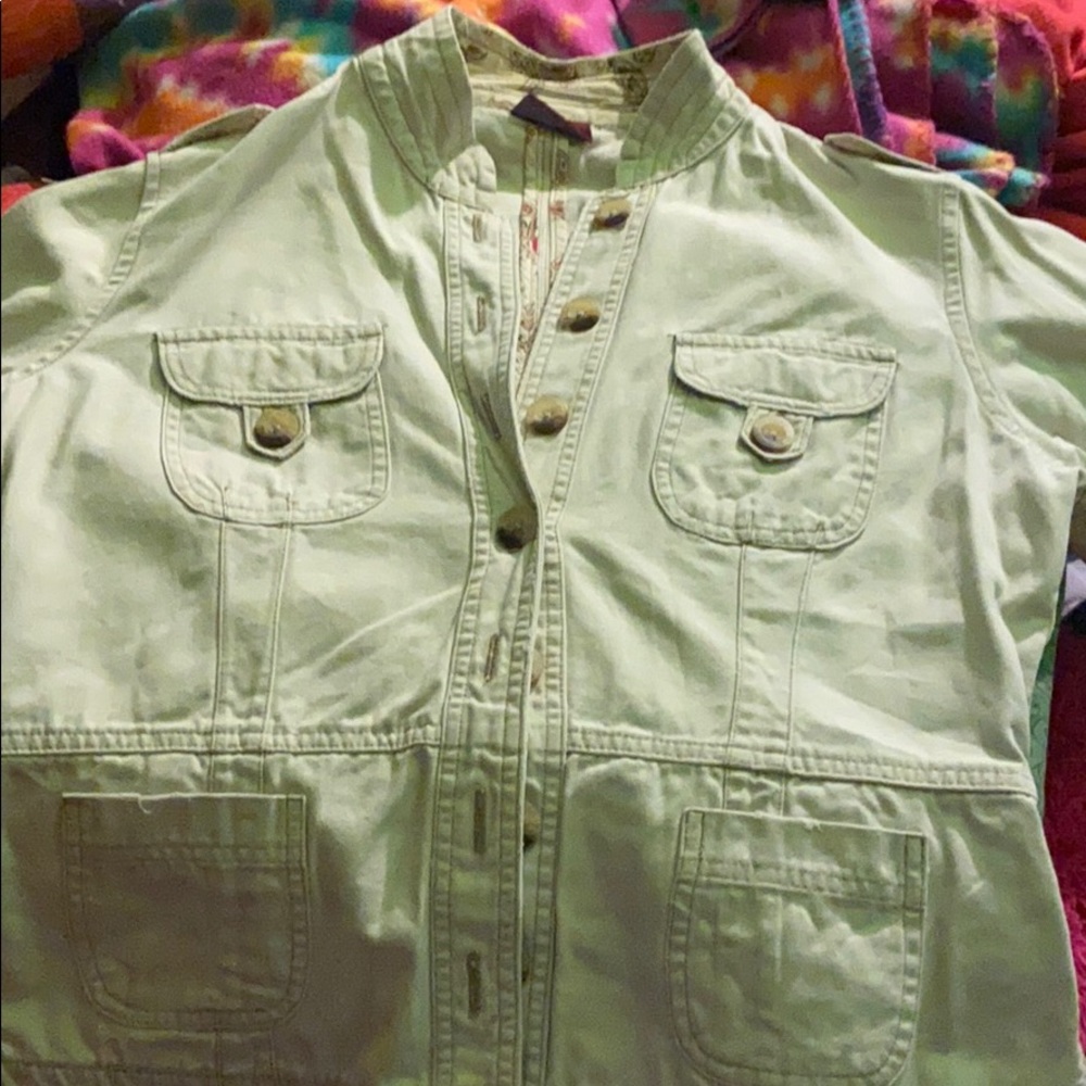 A khaki throw on jacket